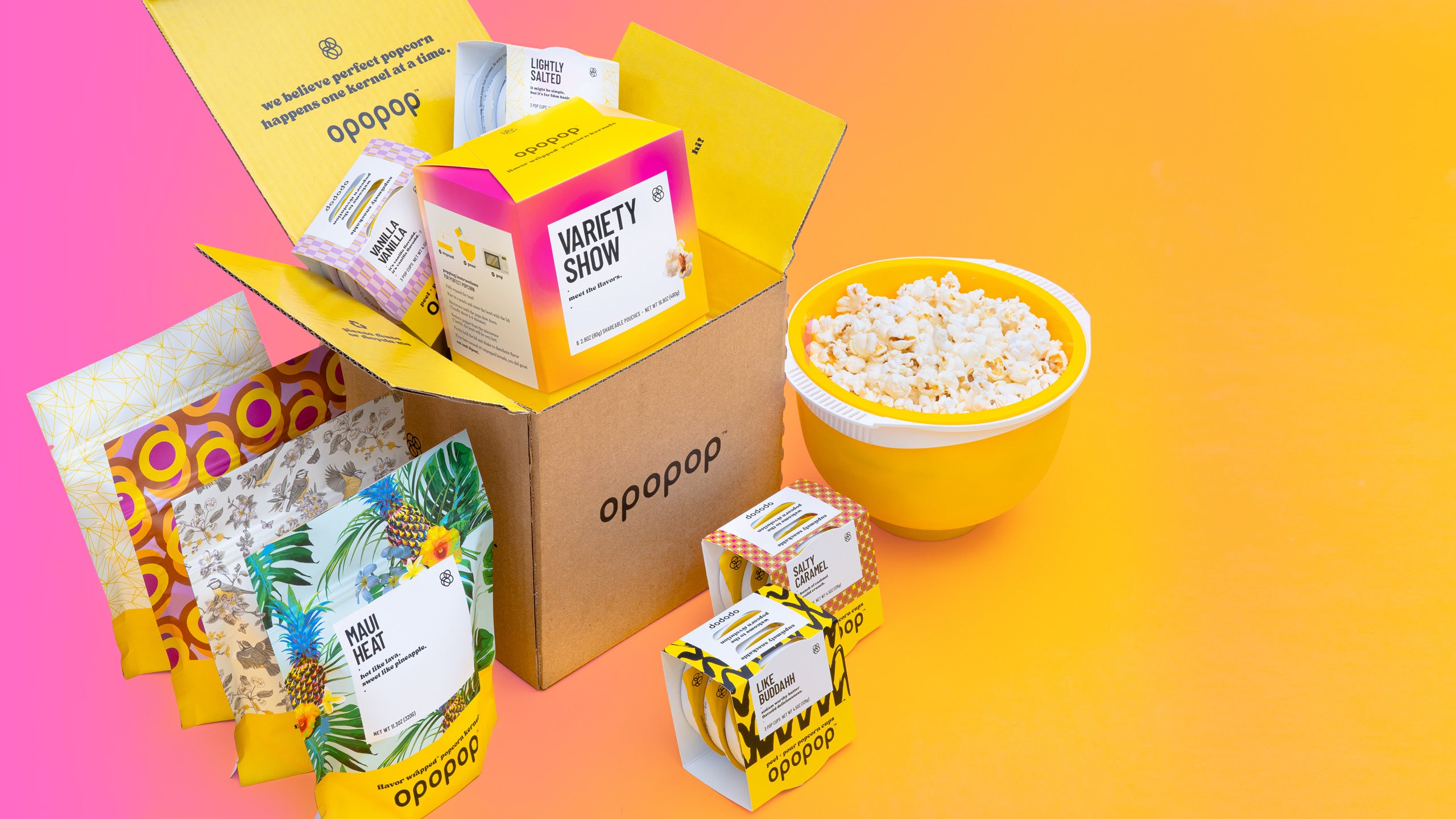Image of a large box full of Opopop popcorn. Introducing Kernel Club our Free Shipping Membership
